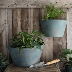 Set Of 2 Patina Metal Wall Planters - Foreside Home & Garden -Eco Haven Store GUEST 33868879 d532 4a81 8691 20e909b785fc