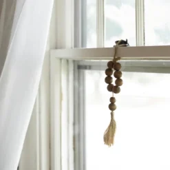Natural Wood & Jute Beaded Tassel - Foreside Home & Garden 11 Natural Wood & Jute Beaded Tassel - Foreside Home & Garden -Eco Haven Store GUEST 9f9d68b1 6f51 4572 96a0 73f31a05c54c
