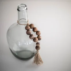 Natural Wood & Jute Beaded Tassel - Foreside Home & Garden 10 Natural Wood & Jute Beaded Tassel - Foreside Home & Garden -Eco Haven Store GUEST c0b79cd3 f2d9 4b00 a70d fc8d4ba8b7d5